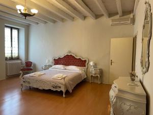 Ένα ή περισσότερα κρεβάτια σε δωμάτιο στο Casa San Martino