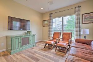 a living room with a couch and chairs and a tv at Fox Ridge Farmhouse - Hill Country Getaway! in San Marcos