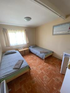 Postel nebo postele na pokoji v ubytování VILAR HOSTEL + 5 fotografií