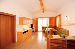 Kuchyňa alebo kuchynka v ubytovaní Appartements Zwölferkogelblick