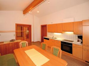 Kuchyňa alebo kuchynka v ubytovaní Appartements Zwölferkogelblick + 18 fotografií
