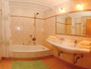 Kúpeľňa v ubytovaní Appartements Zwölferkogelblick