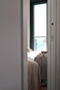 Postel nebo postele na pokoji v ubytování Balcon Del Mar Nerja + 12 fotografií