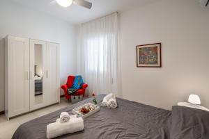 A bed or beds in a room at Villa DellAcqua
