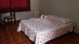 Postel nebo postele na pokoji v ubytování Hostal Kmr