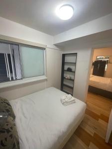 Manly Waves Studios & Apartments客房内的一张或多张床位