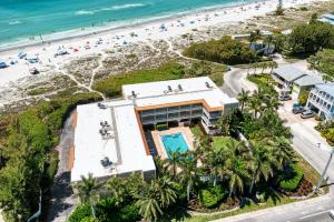 an aerial view of a hotel and the beach at AMI Dreaming - 4200 Gulf 105 in Holmes Beach