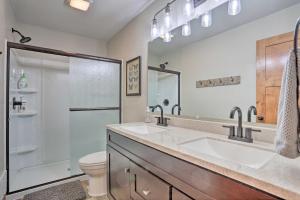 a bathroom with a sink and a shower and a toilet at Sturgis Home with Private Hot Tub Golf and Hike! in Sturgis +36 photos
