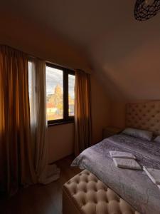 Кровать или кровати в номере Hotel Bagineti