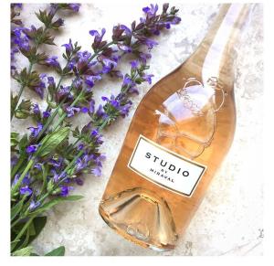 a wooden spoon sitting next to some purple flowers at Oustaou de Betty et Bob in Le Cailar +13 photos