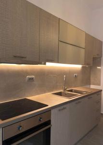 a kitchen with a sink and a counter top at Marina's House in Triovasálos