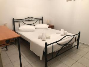 Posteľ alebo postele v izbe v ubytovaní L's apartments