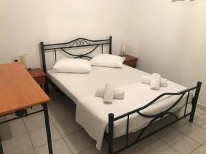 Posteľ alebo postele v izbe v ubytovaní L's apartments