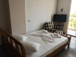 Posteľ alebo postele v izbe v ubytovaní L's apartments