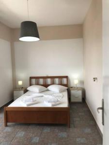 Posteľ alebo postele v izbe v ubytovaní L's apartments