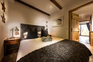 Łóżko lub łóżka w pokoju w obiekcie residenz5360