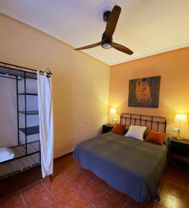 Ein Bett oder Betten in einem Zimmer der Unterkunft Calle Nueva 12