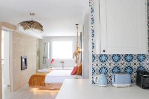 Postel nebo postele na pokoji v ubytování LOFT PLAYA SALINAS CALPE, Grupo Terra de Mar, alojamientos con encanto