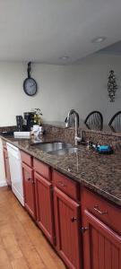 a kitchen with a sink and a counter top at J.Creek Retreat, creekside townhouse +1 car garage in Maggie Valley