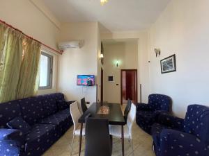 TV a/nebo společenská místnost v ubytování The First Hotel Saranda