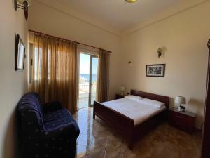 Postel nebo postele na pokoji v ubytování The First Hotel Saranda