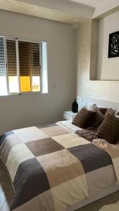 Postel nebo postele na pokoji v ubytování Tiwaline Tarsime App D
