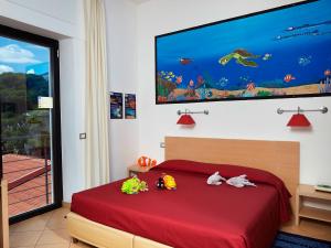 Postel nebo postele na pokoji v ubytování Hotel Cala Luna
