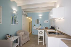 Køkken eller tekøkken på En..Suite