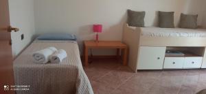 Postel nebo postele na pokoji v ubytování Garda View Apartment