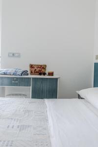 Postel nebo postele na pokoji v ubytování Hotel Lucerna