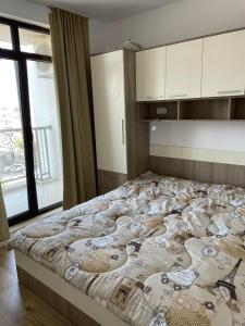 Cama ou camas em um quarto em Aivazovski park - Pomorie SP apartments