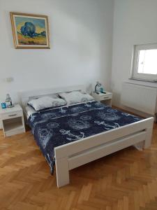 Posteľ alebo postele v izbe v ubytovaní Apartments "Jope i Toni"
