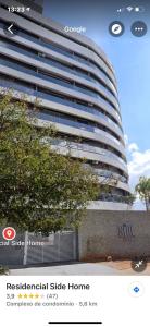 a rendering of a tall apartment building with a tree at FlatsRose SH Universitário PUC UFG HC 44 in Goiânia