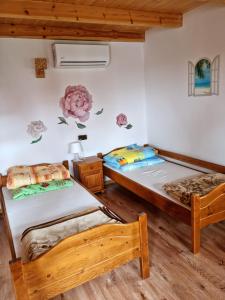 Postel nebo postele na pokoji v ubytování Ośrodek Wypoczynkowy Hacjenda