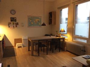 a kitchen and dining room with a table and chairs at Historical center Antwerp, all on foot in Antwerp