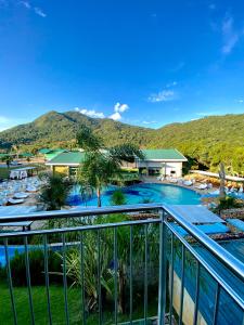 an aerial view of a resort with a swimming pool at Capivari Ecoresort in Campina Grande do Sul