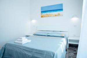 Postel nebo postele na pokoji v ubytování Torre del Salento