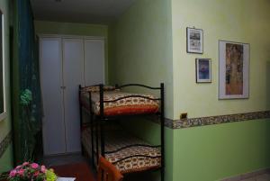 Voodi või voodid majutusasutuse B&B Al Porto toas