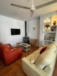 A television and/or entertainment centre at Casa Salamanquesa