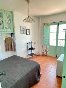 A bed or beds in a room at Casa Salamanquesa
