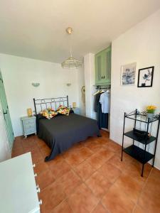 A bed or beds in a room at Casa Salamanquesa