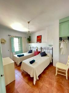 A bed or beds in a room at Casa Salamanquesa