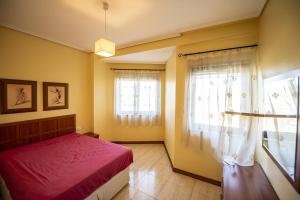Ένα ή περισσότερα κρεβάτια σε δωμάτιο στο Samil Apartment, primera línea de playa con Wifi y Garaje +7 φωτογραφίες