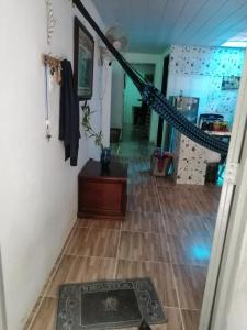 a room with a staircase and a rug on the floor at APARTA-Refugio El Retiro Verde in Leticia