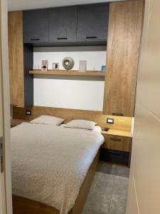 Posteľ alebo postele v izbe v ubytovaní Apartman Mala