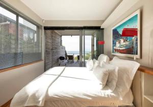 Postel nebo postele na pokoji v ubytování Seaview Apartment in Muizenberg