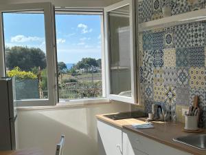 Фотография из галереи BlueSun Apartments в городе Leporano Marina
