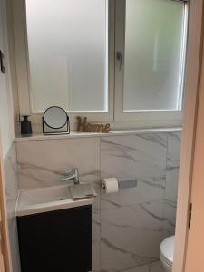 Kúpeľňa v ubytovaní Apartman Mala