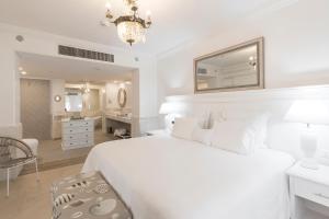 Cama ou camas em um quarto em La Mision Hotel Boutique