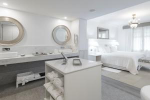 Cama ou camas em um quarto em La Mision Hotel Boutique